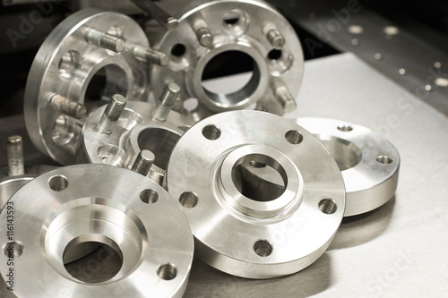 Metal mold of flanges and bolts. CNC milling/lathe industry photo