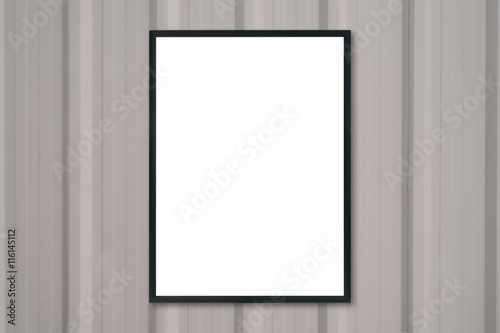 Mock up blank poster picture frame on wood wall.