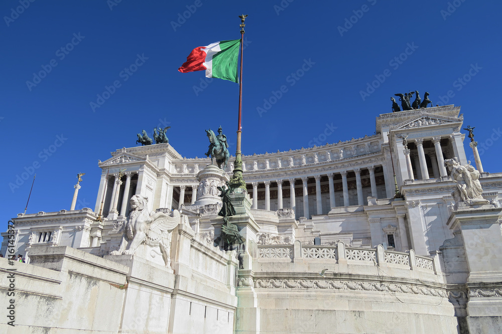 Italian flag at Altare della Patria the Monument to Victor Emmanuel II Rome.  Monumento Nazionale a Vittorio Emanuele II is a monument built in honor of the first king of unified Italy.