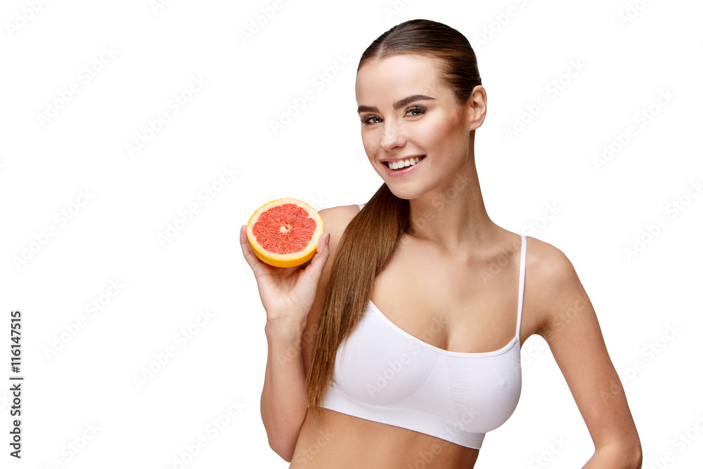 portrait of attractivesmiling woman holding grapefruit isolated on white portrait of attractivesmiling woman holding grapefruit isolated on white