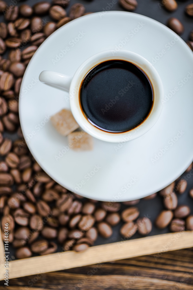 espresso coffee on roasted coffee beans espresso coffee on roasted coffee beans