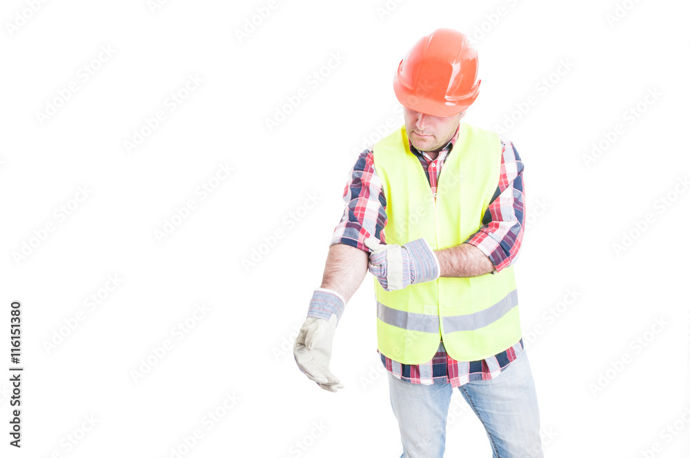 Male builder at work in protection clothes