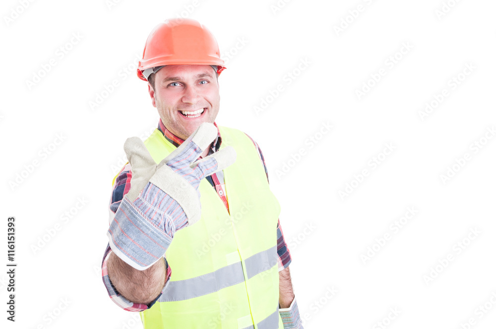 Joyful male builder showing number three Joyful male builder showing number three