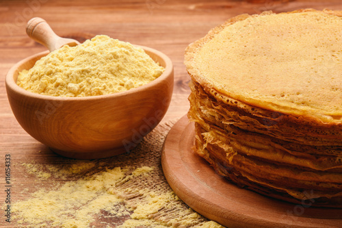 Stack of gluten free pancakes made from corn flour .