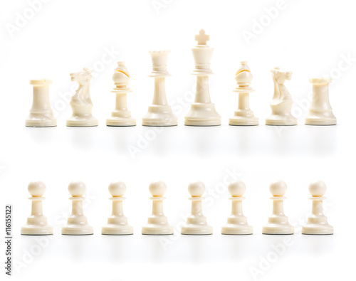 wooden chess set  lined up in rows isolated