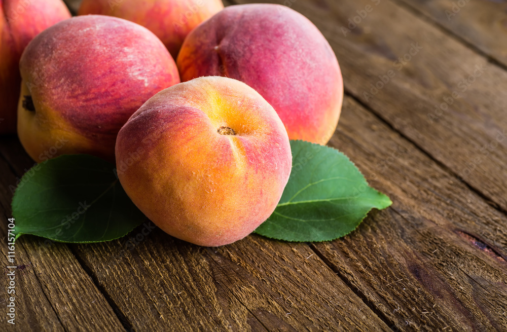 fresh peaches on wood background fresh peaches on wood background