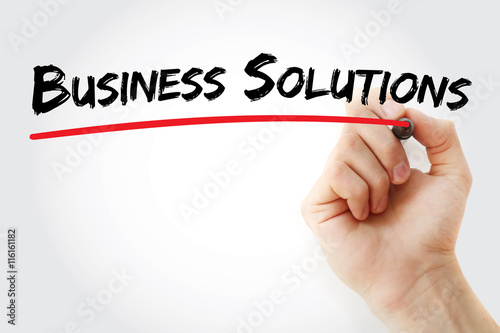 Hand writing Business Solutions with marker, concept background