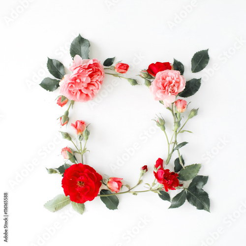 round frame wreath pattern with roses, pink flower buds, branches and leaves isolated on white background. flat lay, top view