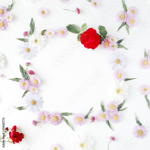 round frame wreath pattern with roses, pink flower buds, branches and leaves isolated on white background. flat lay, top view