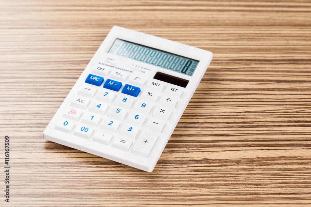 Digital calculator on table close-up Digital calculator on table close-up