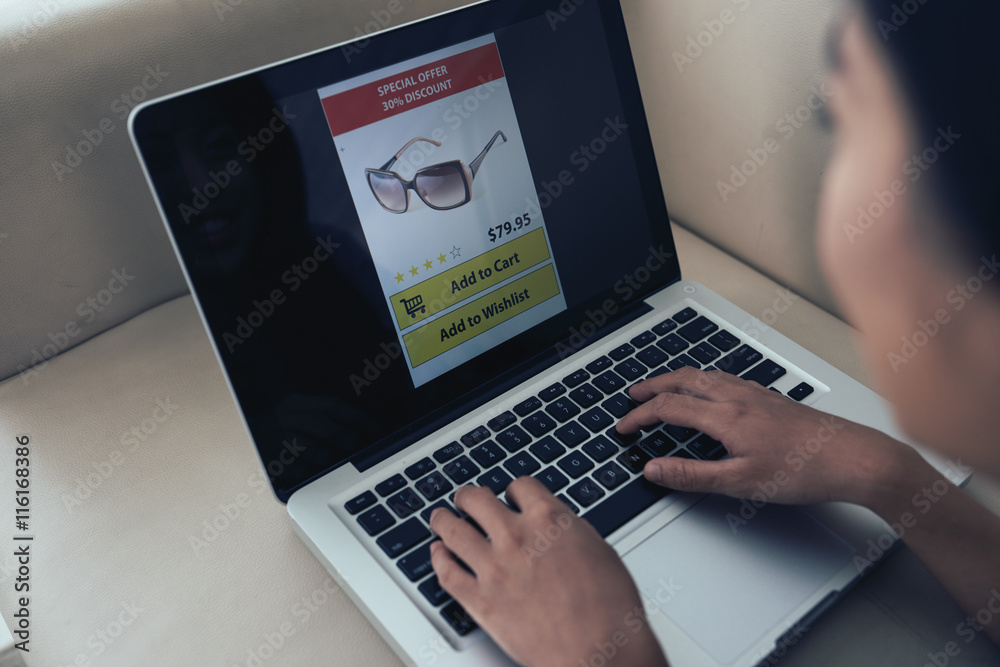 Young woman buying new sunglasses in online store Young woman buying new sunglasses in online store