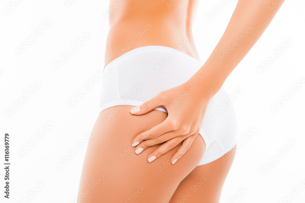 Close up portrait of shapely woman checking cellulite on her ass Close up portrait of shapely woman checking cellulite on her ass