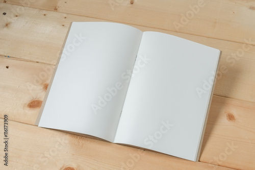 recycle notebook on wood background
