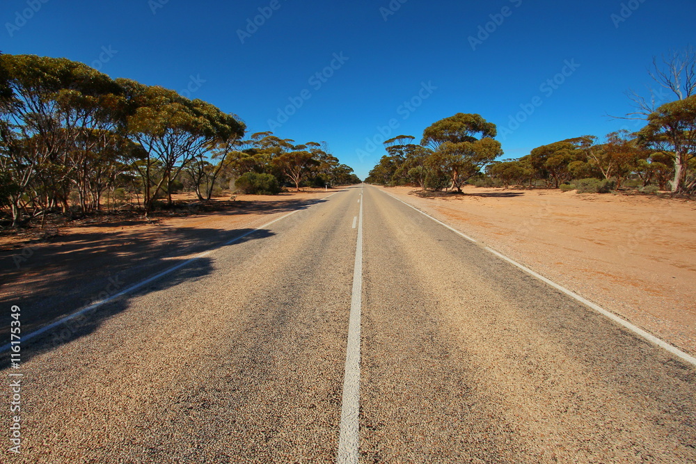 Straight road through Australian outback Straight road through Australian outback