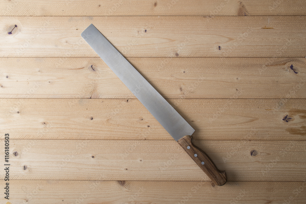 knife on wooden background