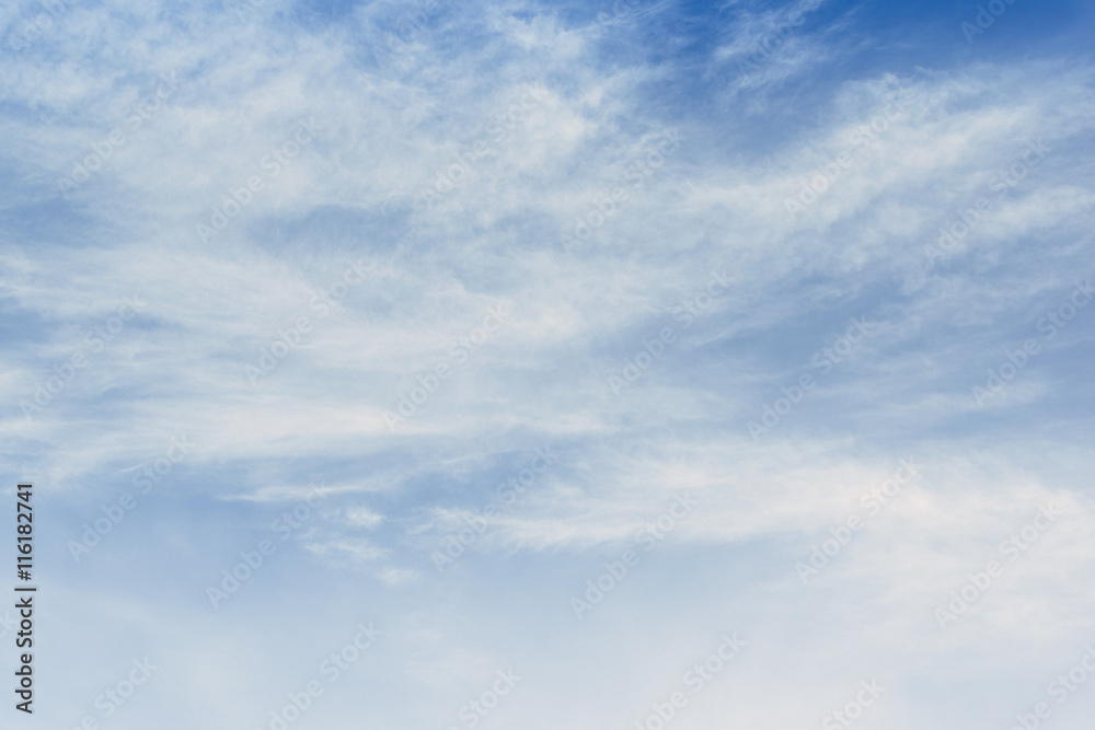 soft white clouds against blue sky for background design