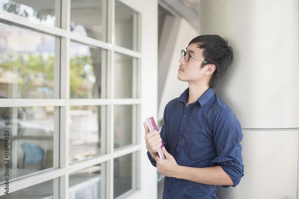 A portrait of an Asian university student on campus A portrait of an Asian university student on campus