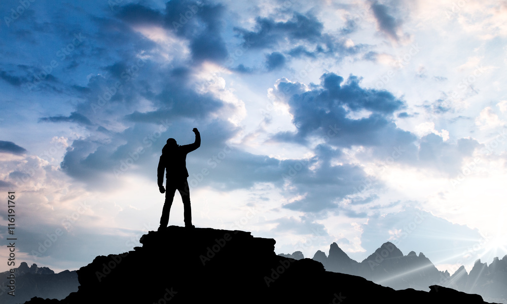 Silhouette of man on the mountain