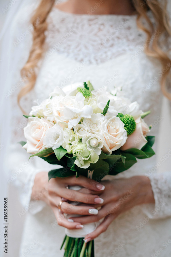nice wedding bouquet in bride's hand