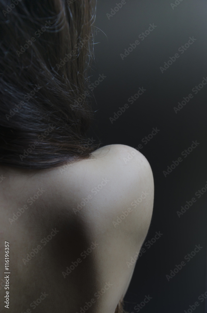 Foto de Espalda desnuda de una joven mujer do Stock