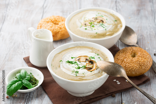 Mushroom cream soup on a table, selective focus