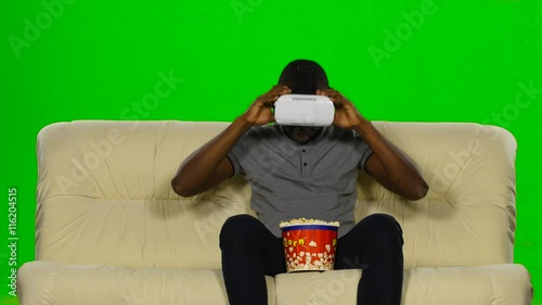 Man in a mask augmented reality device. Green screen photo