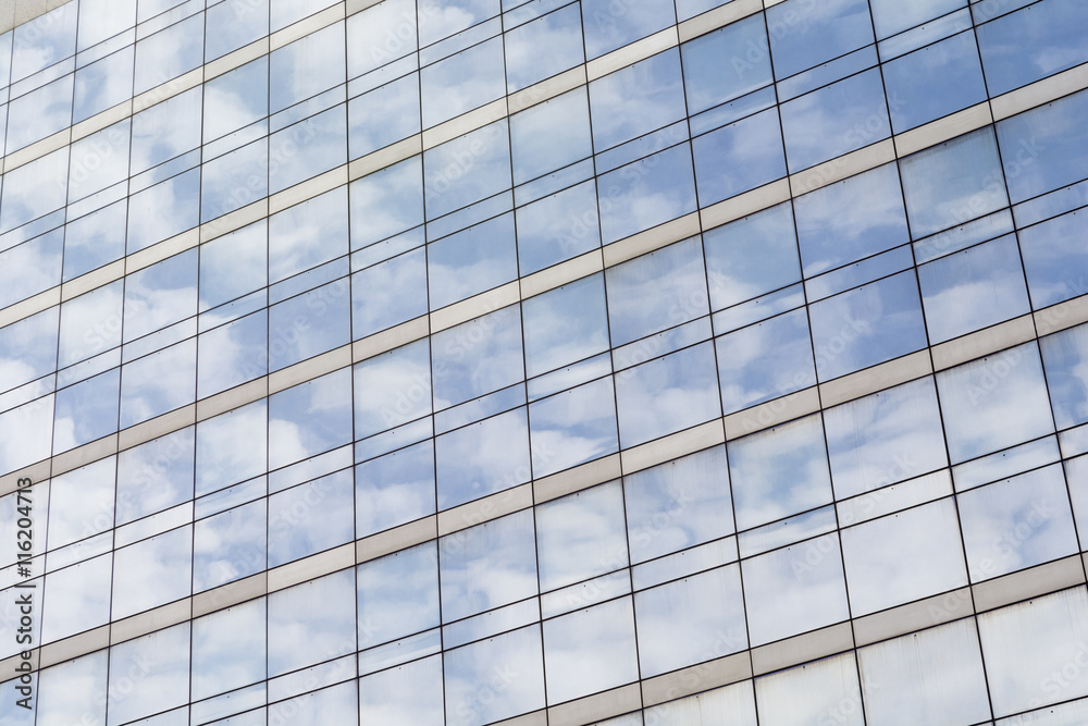 Reflection of clouds on a glass facade