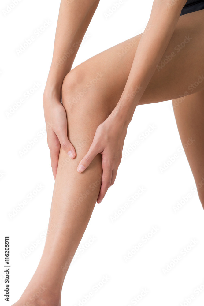 woman holding her beautiful healthy long leg with massaging shin and calf in pain area, Isolated on white background. woman holding her beautiful healthy long leg with massaging shin and calf in pain area, Isolated on white background.