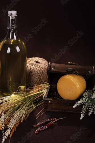 Various cheeses on the wooden board photo