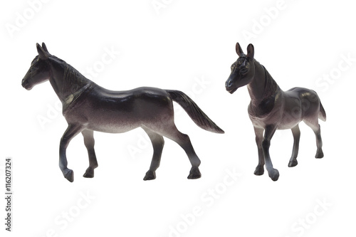 Isolated black horse toy profile and angle view photo. © syberianmoon