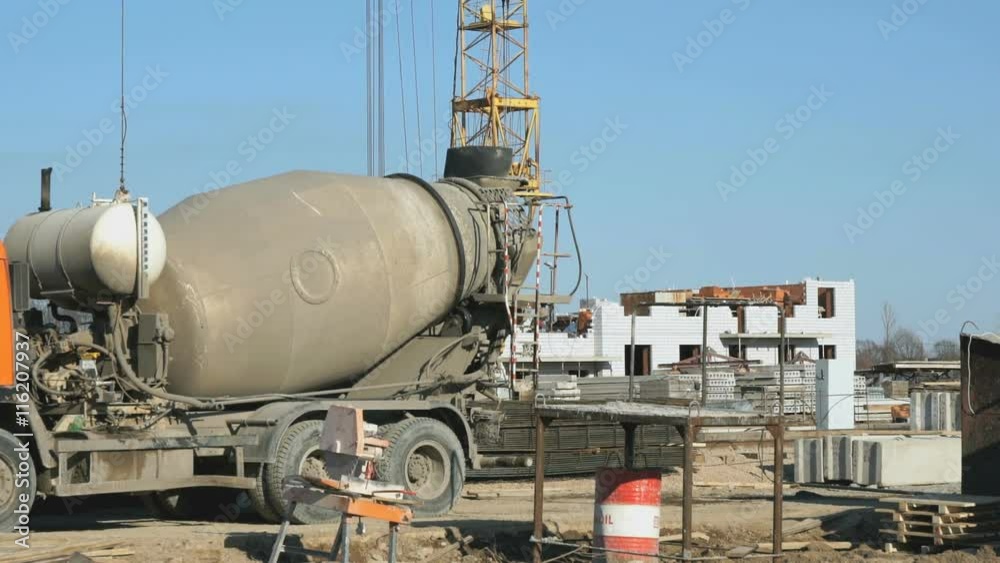 Delivery of concrete on building site using truck Delivery of concrete on building site using truck