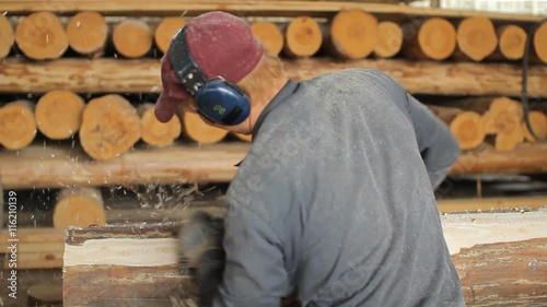 Male wood handles electric planers for future home. Work makes wooden house photo