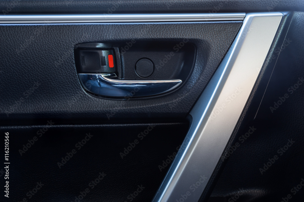 Door handle inside the modern car is black interior