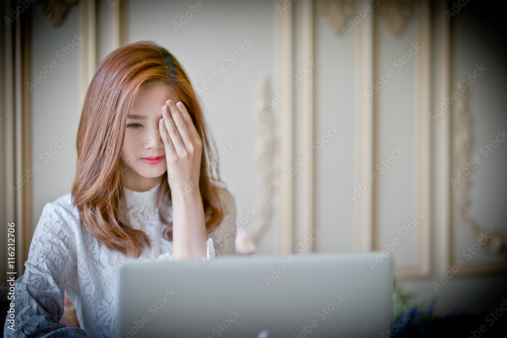 Woman with laptop watching horror movie Woman with laptop watching horror movie