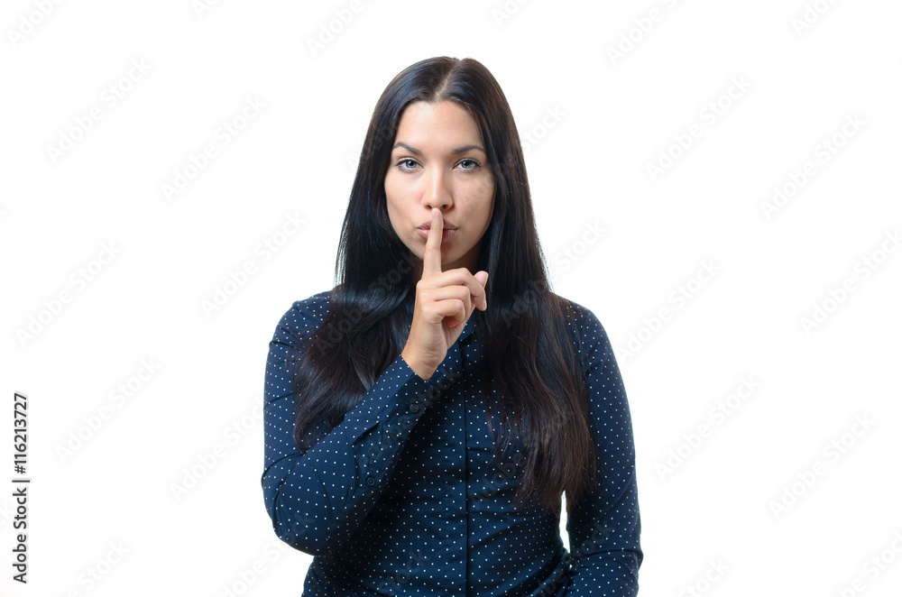 Pretty woman making a shushing gesture Pretty woman making a shushing gesture