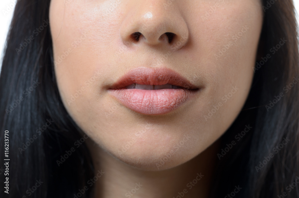 Natural lips and mouth of a young woman