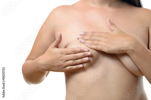 Woman doing a breast examination