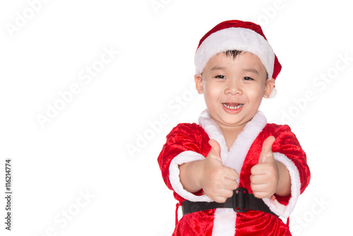 Christmas time - boy with Santa Claus Hat. Young boy as Santa Cl