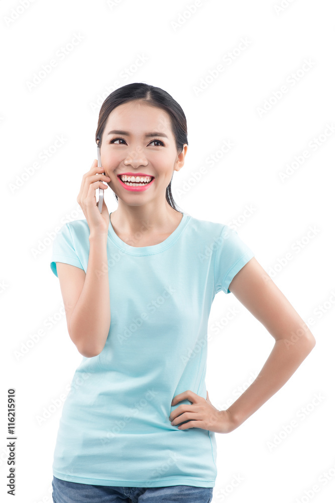 Portrait of smiling young girl talking on the phone Portrait of smiling young girl talking on the phone