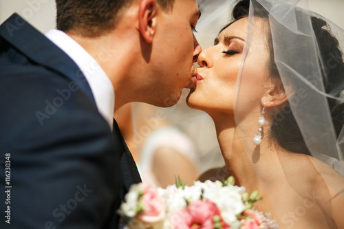 The brides kissing photo