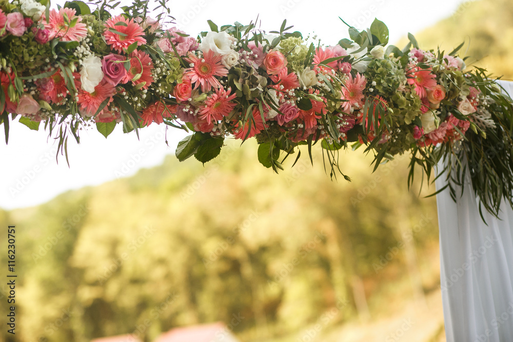 Fototapeta premium The wedding archway with flowers