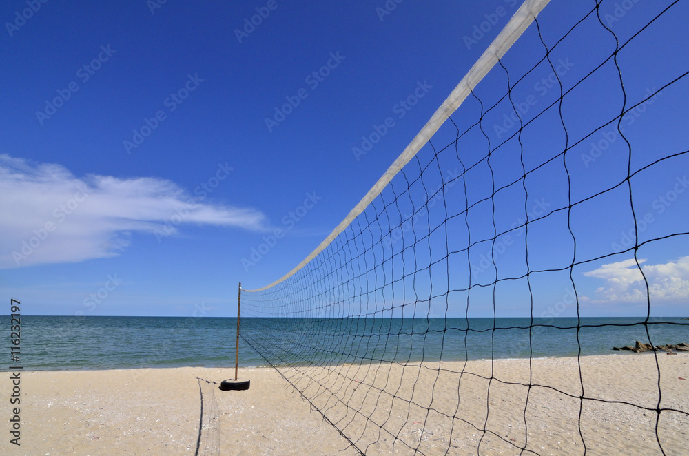 Clear Blue Sky and Sunny on the beach.
Umbrella, Bed, Volleyball Net all activity on the beach with sunny day, clear and blue sky, sea and white sand.