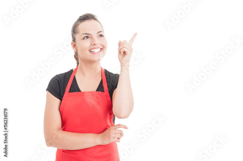 Cheerful supermarket seller looking excited