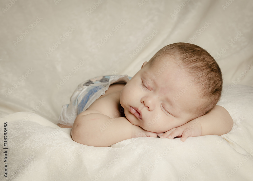 Sleeping caucasian new baby in his silky bed Sleeping caucasian new baby in his silky bed