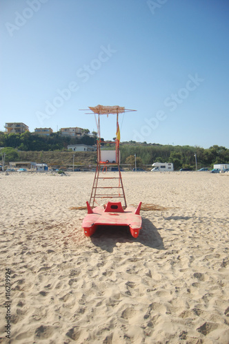 Lonely lifeguard tower on a deserted morning beach