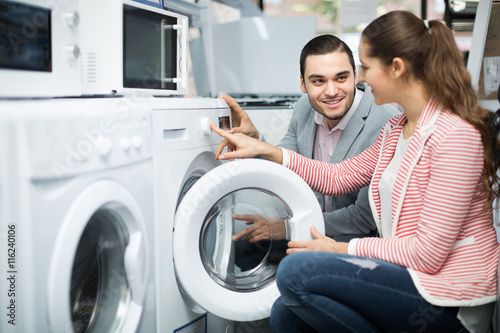 Customers choosing washing machine