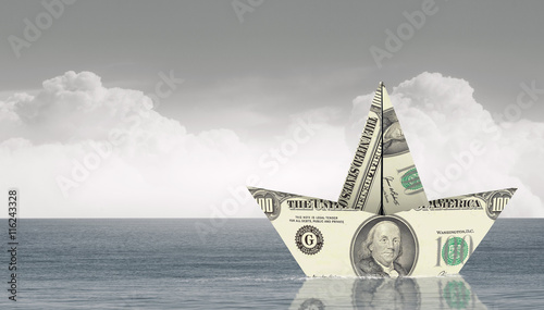 Dollar paper boat . Mixed media