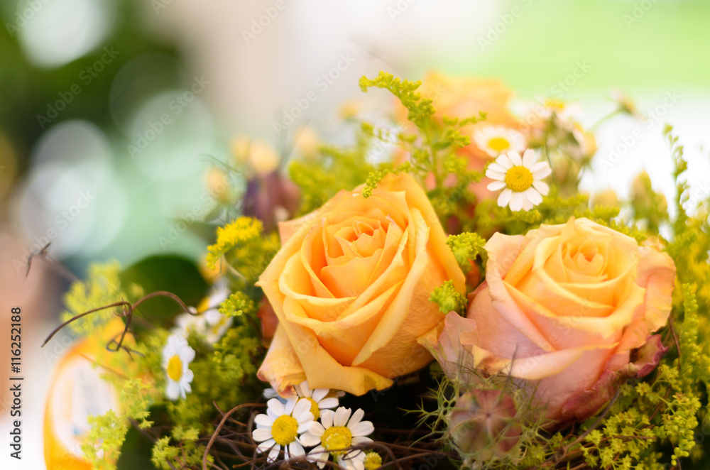 Bouquet of fresh flowers with orange roses