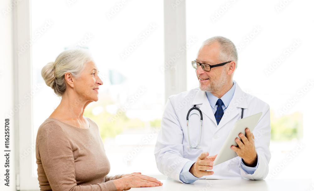 smiling senior woman and doctor with tablet pc smiling senior woman and doctor with tablet pc