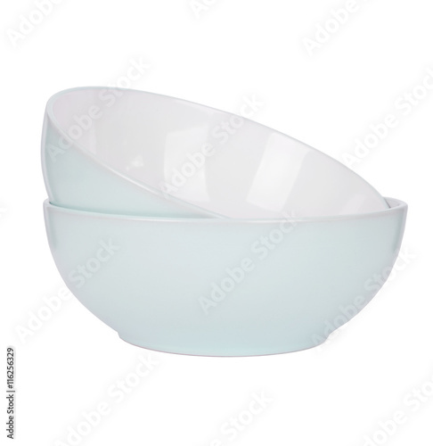 A stack of blue dinner bowls isolated on a white background